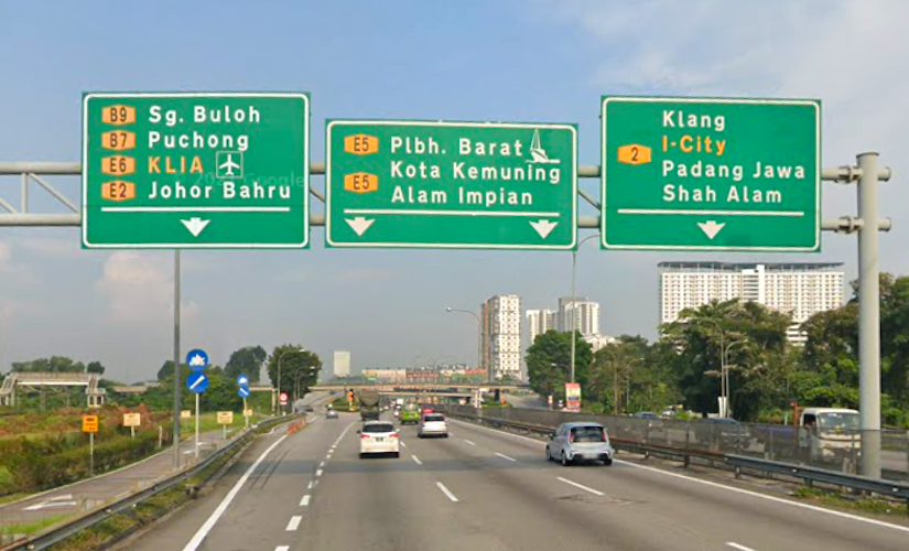 green highway road sign