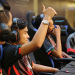 Malaysian youth playing e-sports in a tournament