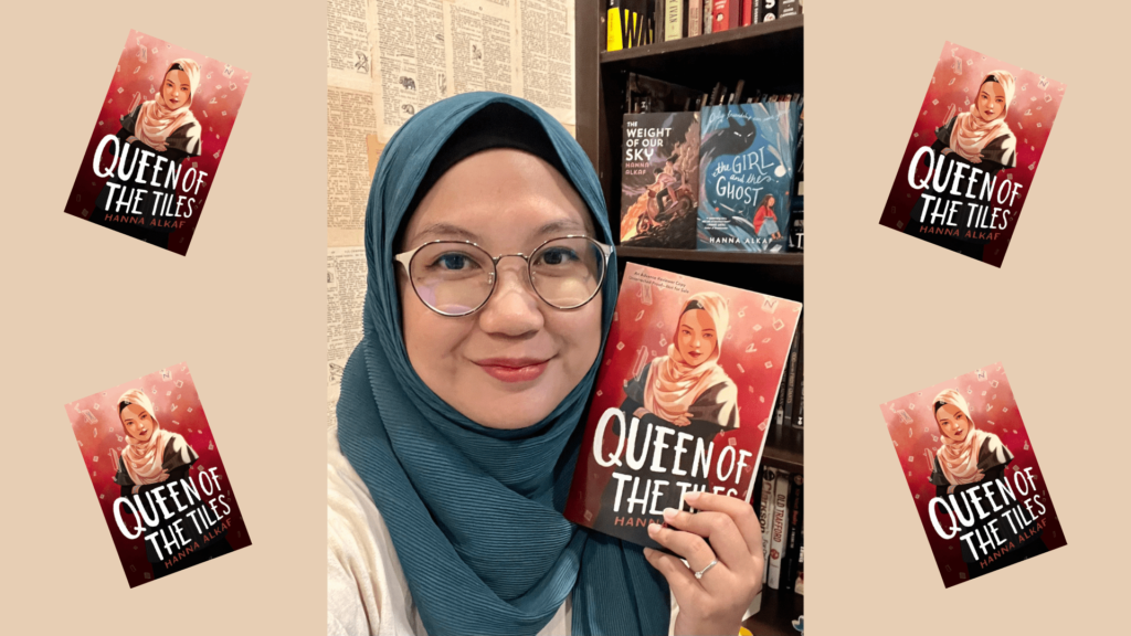 Hanna with her collection of published books