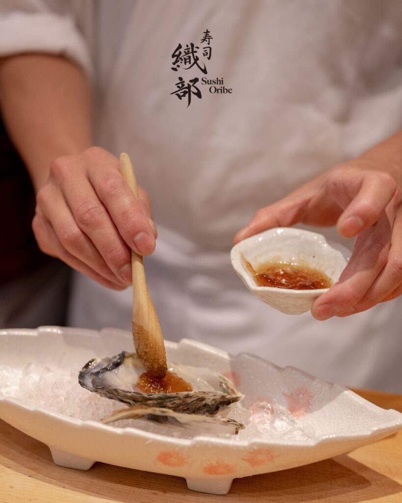 omakase preparation by expert chefs of oribe sushi in kuala lumpur