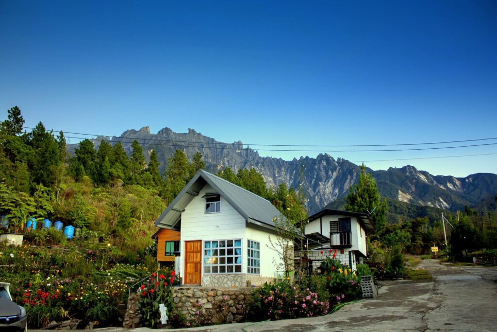 cabin village with view of mount kinabalu
