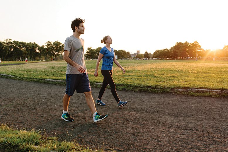 A Man and Woman  Taking A Walk And Enjoying Their Day