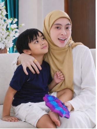 Malaysian singer and celebrity mum Adira Suhaimi with a young child