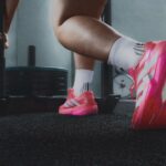 Athlete wearing the pink adidas Adizero Dropset Pro during a hybrid training session