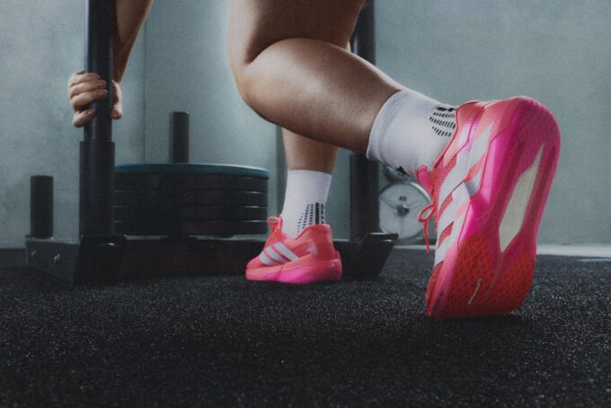 Athlete wearing the pink adidas Adizero Dropset Pro during a hybrid training session