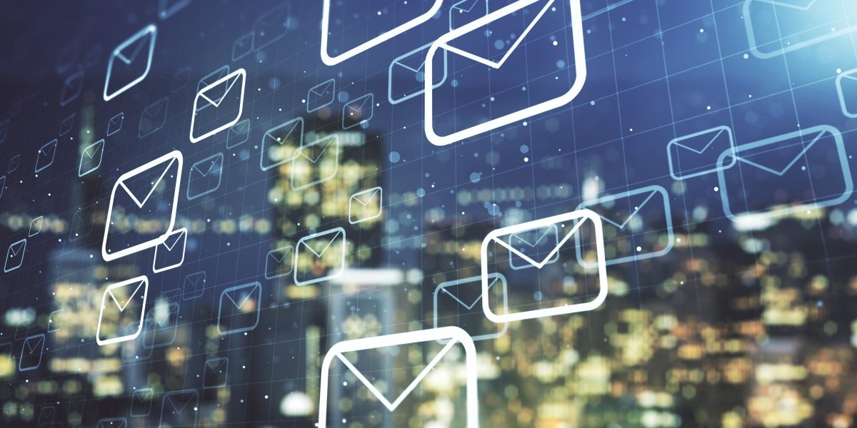Phishing emails flooding workplace inboxes, illustrated as email icons over a city skyline