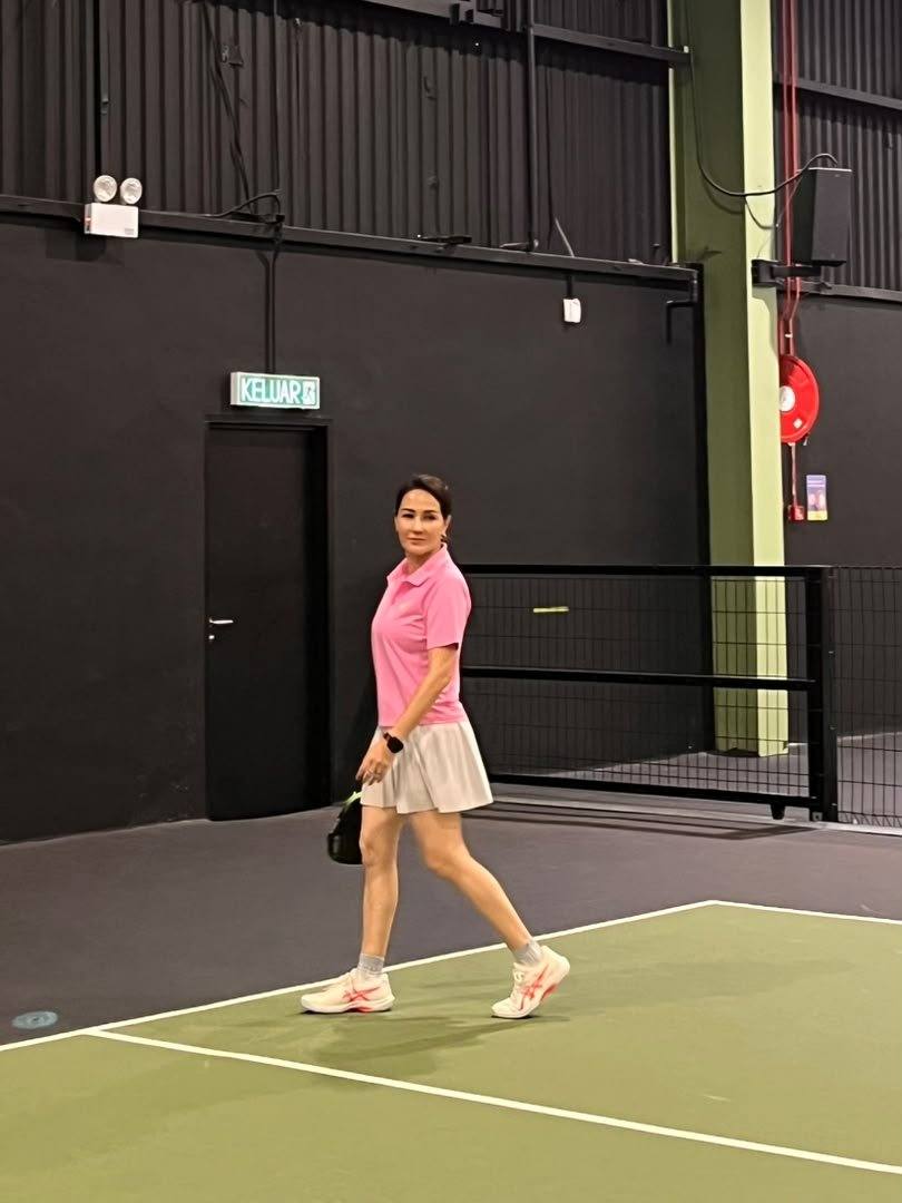 Actress Yasmin Hani Richardson on court in ASICS apparel at World Pickleball Day