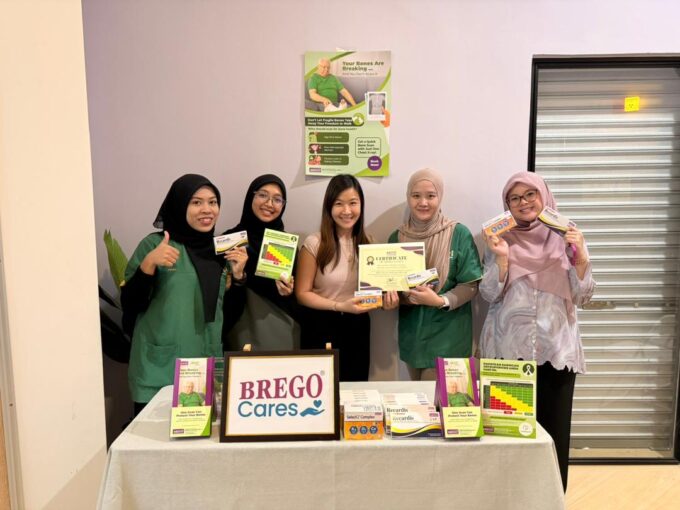 Clinic team holding a BREGO Cares certificate of appreciation and bone health screening materials