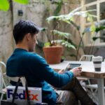 FedEx Import Tool user managing shipment clearance on a tablet