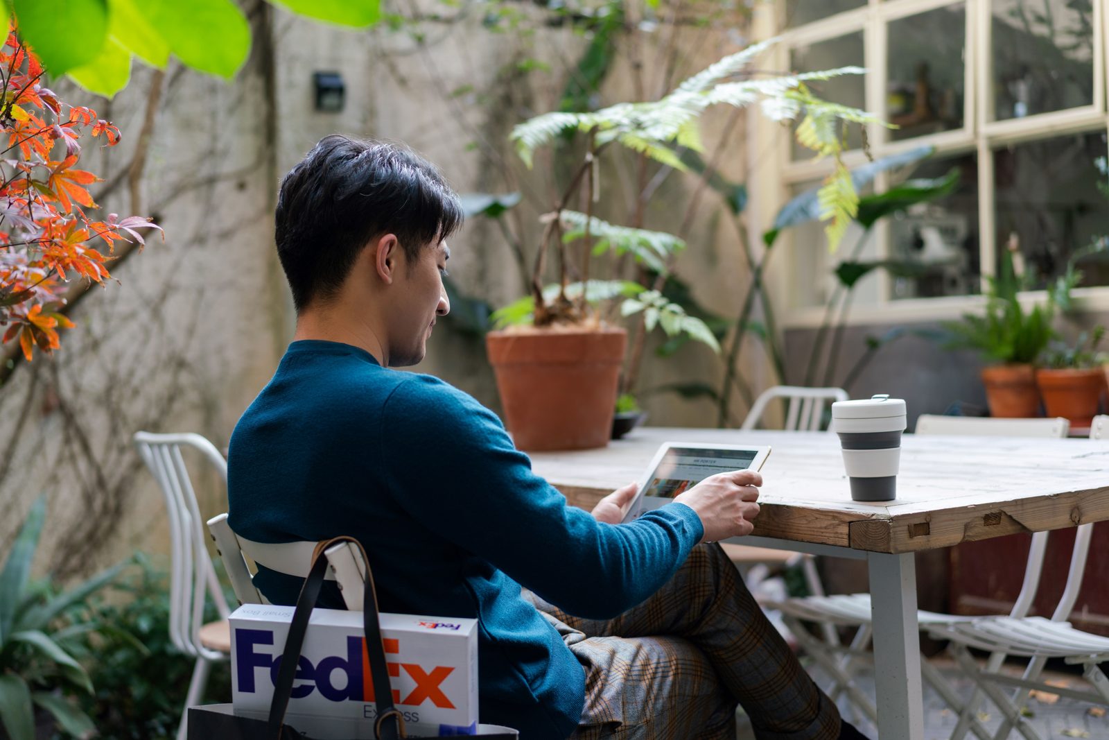 FedEx Import Tool user managing shipment clearance on a tablet