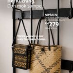 IKEA Kuching NIPÅSEN coat rack and bench in black with two woven bags hanging on its hooks, priced at RM279