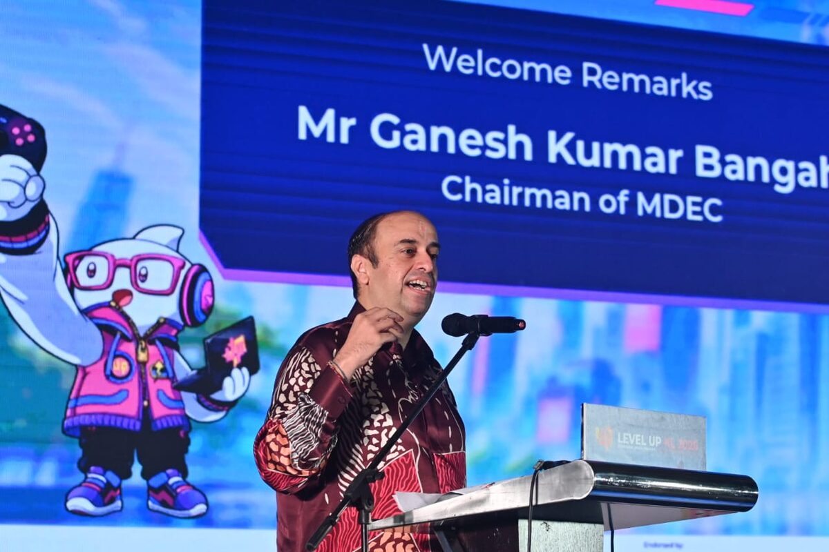 MDEC Chairman Ganesh Kumar Bangah giving welcome remarks at LEVEL UP KL 2026