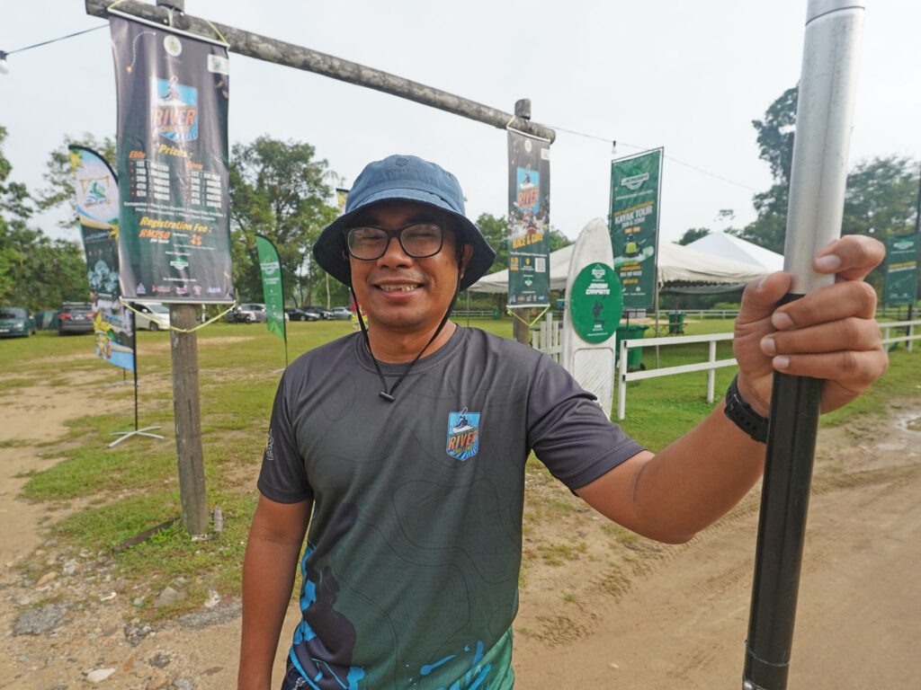Little Amazon of Terengganu River Challenge race director Mohd Najib Alias holding a paddle