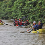 Participants paddling along Sungai Berang during the Little Amazon of Terengganu River Challenge