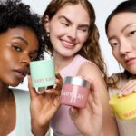 Mary Kay K-Beauty Texture Edit special-edition skincare trio held by three women