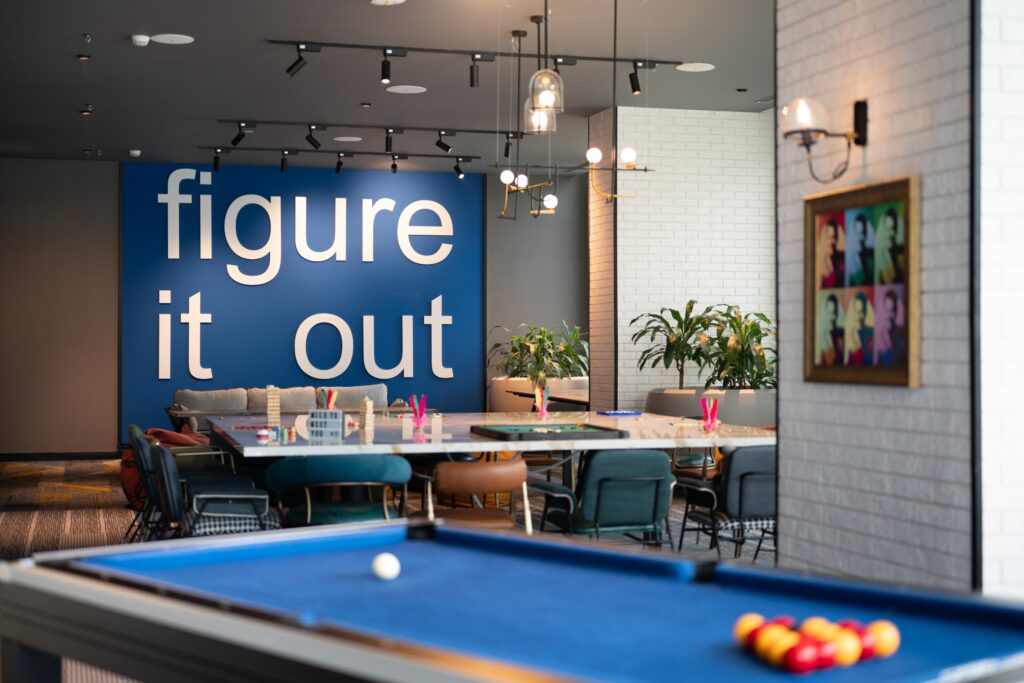 Fun Room 5 brainstorming zone at Moxy Putrajaya with a pool table and board games