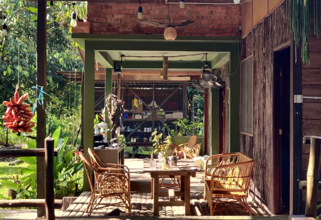 The Big Guesthouse veranda in Tamparuli, Sabah, overlooking the Kiulu Valley