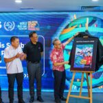Communications Minister Dato' Seri Fahmi Fadzil unveils the Pos Malaysia World Post Day 2026 commemorative stamp
