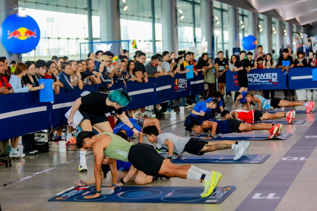 Athletes tackle the push-up station at Red Bull Power Race