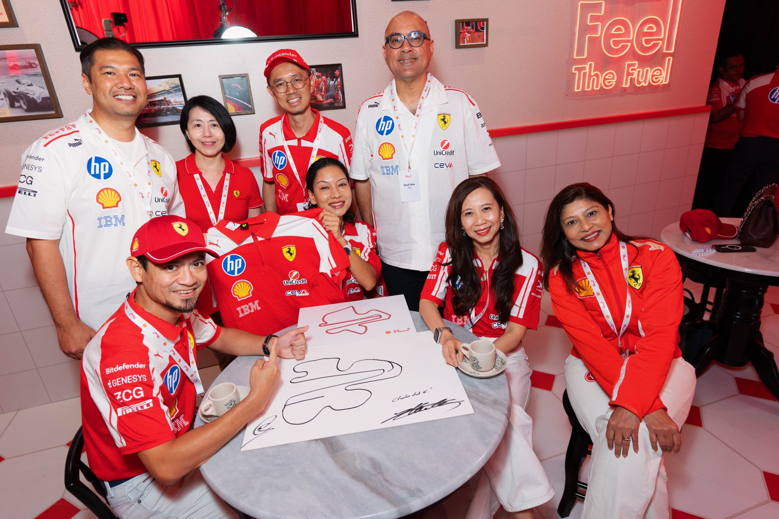 Shell V-Power fans with signed track drawings at the Feel The Fuel space