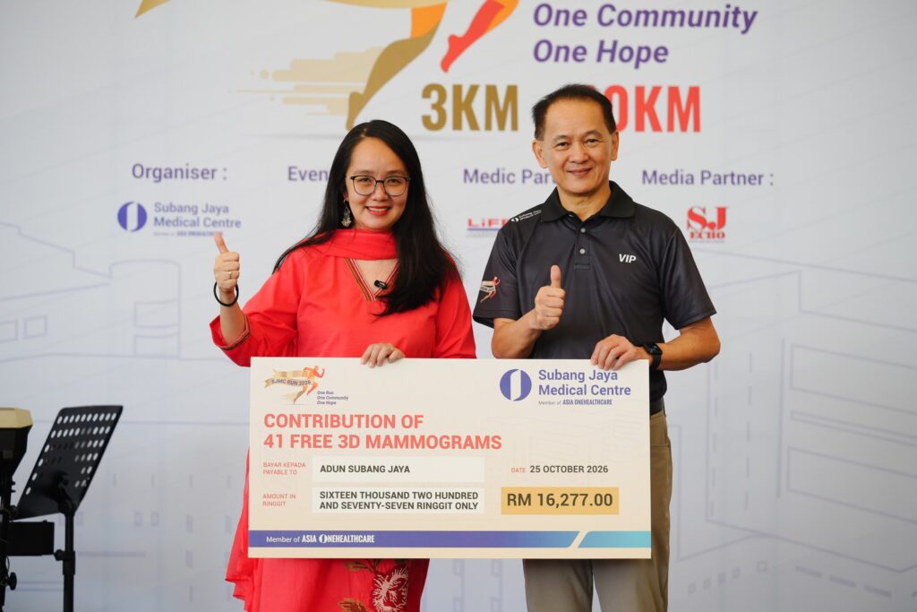 SJMC mock cheque for 41 free 3D mammograms presented to YB Michelle Ng Mei Sze
