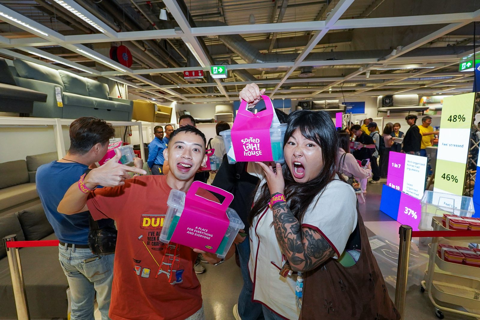 Visitors holding Sorted Lah! house storage kits at IKEA Malaysia